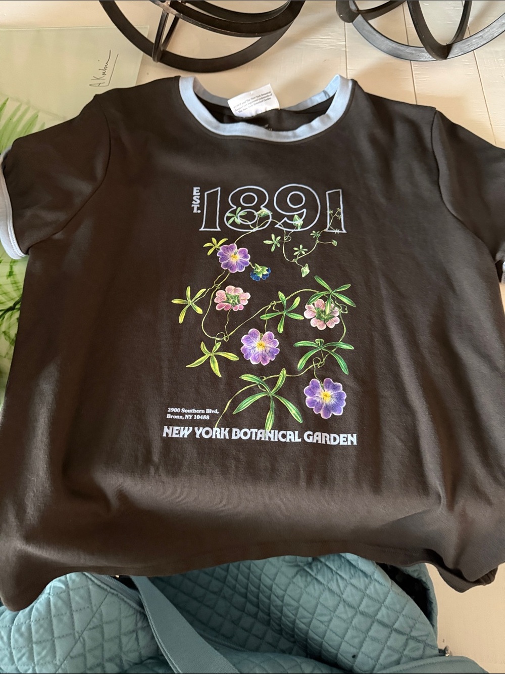 Cotton On brown Tee with Pastel Floral Graphic and Light Blue Trim